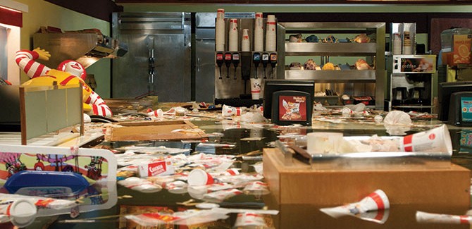 SUPERFLEX, Flooded McDonalds (still) 2009, RED video installation: colour, sound, 20 minutes, 16:9, 400 x 700cm (variable). Purchased 2010 with funds from Tim Fairfax, AM, through the Queensland Art Gallery Foundation Collection: Queensland Art Gallery. Cornucopia, Shepparton Art Museum (SAM) 70 Welsford St Shepparton (VIC), 27 February – 23 March 2016